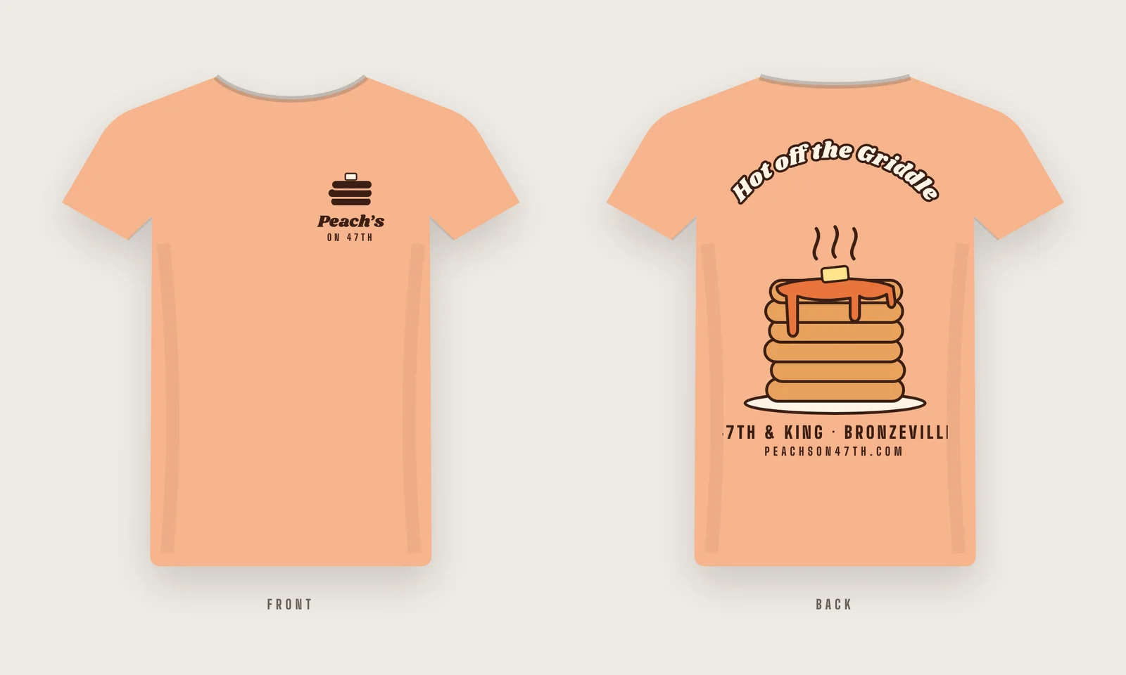 Peach-colored tee, front: small pancake-stack chest logo; back: a steaming syrup-covered pancake stack under the words Hot off the Griddle